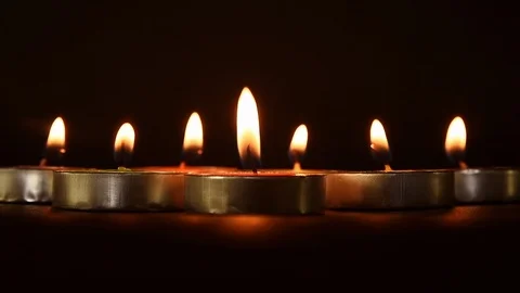 Candlelights in a black background Stock Footage 120525434