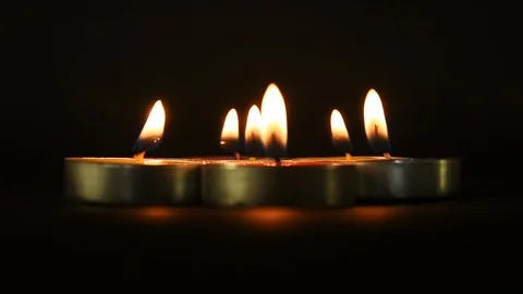 Candlelights in black background Stock Footage 121185650