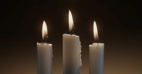 Candles against dark background. Stock Footage 327118225