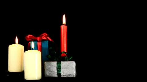 Candles and gift on black background Stock Footage 10733199