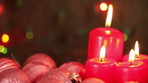Candles and pink balloons on a background of a garland flashing. Christmas still Stock Footage 67358024