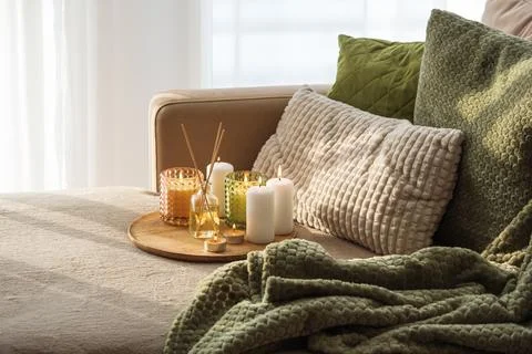 Candles and Reed Diffuser on Wooden Tray. Cozy Home Decor lifestyle with Cu.. Stock Photos
