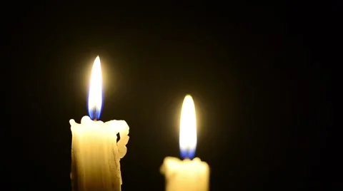 Candles and wind, blinking flame Stock Footage 48576406