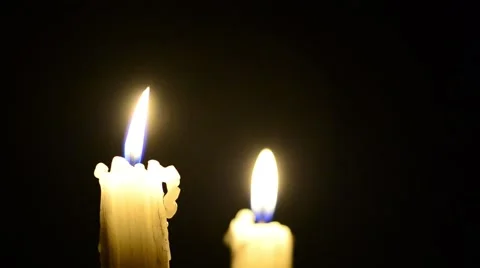 Candles and wind, blinking flame Stock Footage 48576423