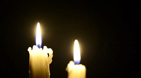 Candles and wind, blinking flame Stock Footage 48576432