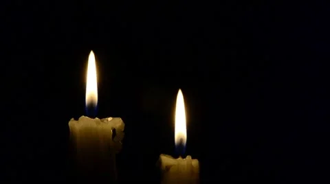 Candles and wind, blinking flame Stock Footage 48576439