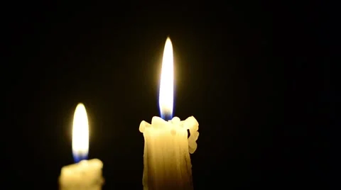 Candles and wind, blinking flame Stock Footage 48576441