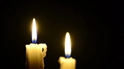Candles and wind, blinking flame Stock Footage 48576466