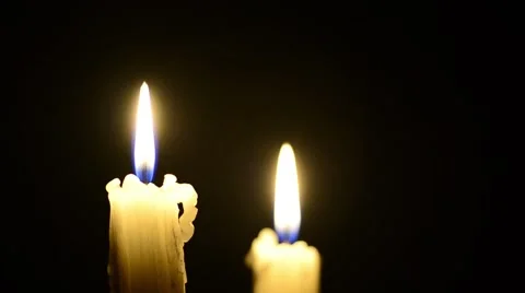 Candles and wind, blinking flame Stock Footage 48576491