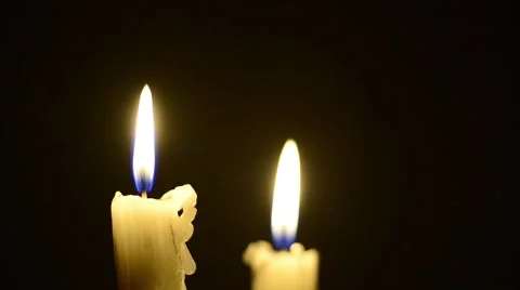 Candles and wind, blinking flame Stock Footage 48576505