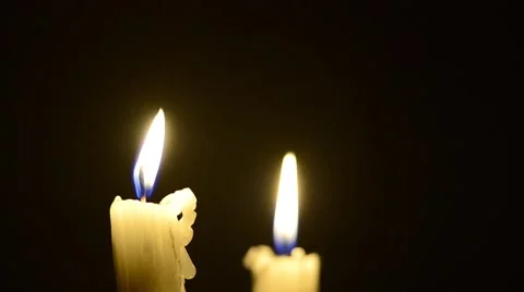 Candles and wind, blinking flame Stock Footage 48576518