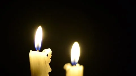 Candles and wind, blinking flame Stock Footage 48576521