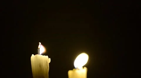 Candles and wind, blinking flame Stock Footage 48576540
