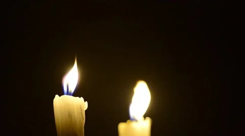Candles and wind, blinking flame Stock Footage 48576570
