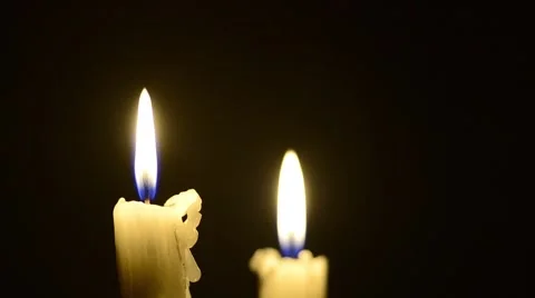 Candles and wind, blinking flame Stock Footage 48576574