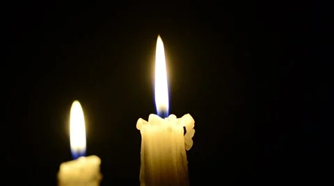 Candles and wind, blinking flame Stock Footage 48576601