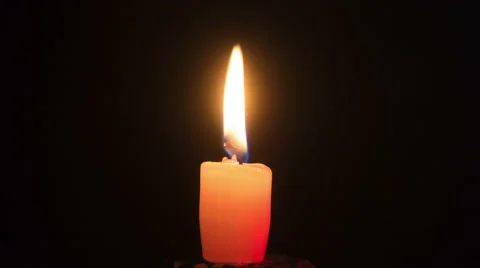Candles are burning on the background black. Time Lapse Stock Footage 68098577