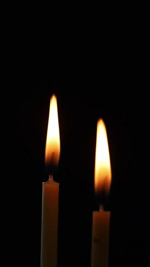 Candles are lit on a dark background Stock Footage 272196495