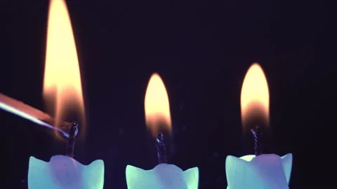 Candles are lit from a match Stock Footage 237294803