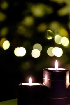Candles with Background Christmas Tree Lights Stock Photos