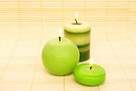Candles on bamboo Stock Photos