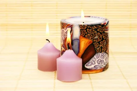 Candles on bamboo Stock Photos