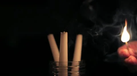 Candles being lit Stock Footage 12491538
