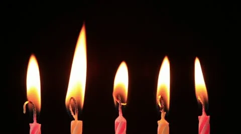 Candles on a Birthday cake burning down, time lapse, reversing Stock Footage 10830037