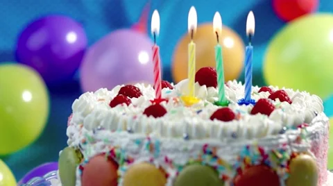 Candles on the birthday cake Stock Footage 60173550