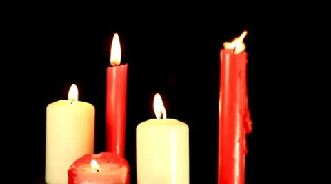 Candles on black background Stock Footage 10702218