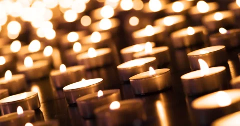 Candles on the Black Surface 4K Stock Footage 104904456