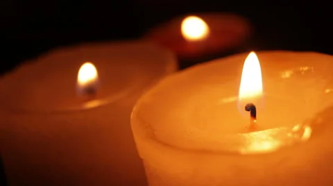 Candles blazing in the dark Stock Footage 47254751