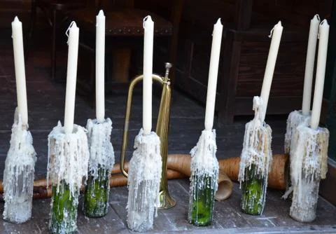 Candles in bottles Stock Photos