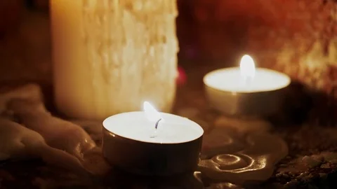 Candles burn in the dark Stock Footage 82956429