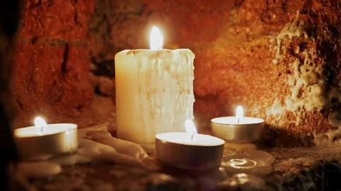 Candles burn in the dark Stock Footage 82956539