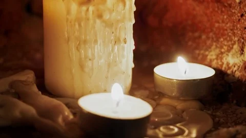 Candles burn in the dark Stock Footage 82956616