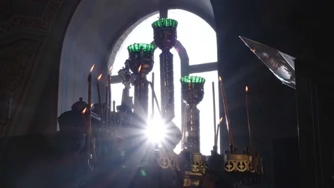 Candles burn in the temple Stock Footage 83488398