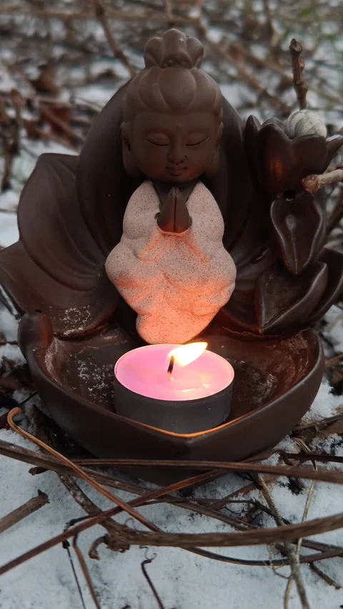 Candles burning against the backdrop of winter nature meditation Stock-Footage 324993377