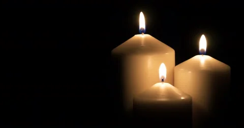 Candles burning on black background 스톡 동영상 133872580
