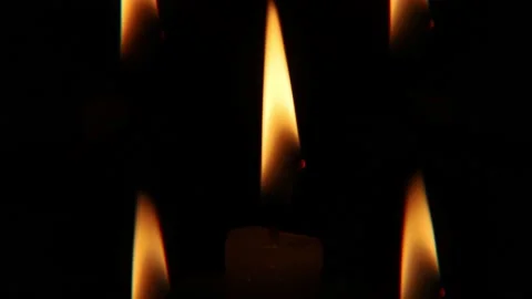 Candles burning in the dark Stock Footage 230226095