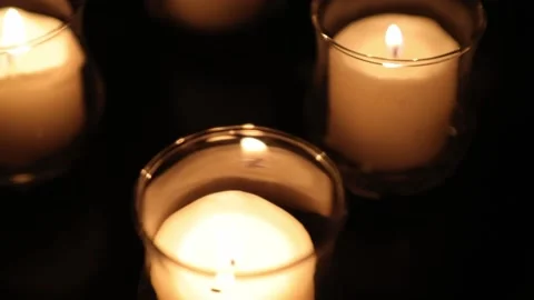 Candles Burning on Dark Table with slow Camera Movement Stock Footage 145202951