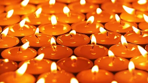 Candles burning in the dark in UHD Video stock 95316800