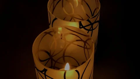 Candles Burning in Glasses in the Dark Stock Footage 123113930