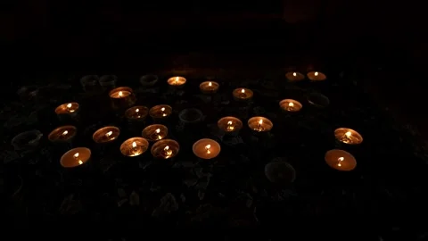 Candles Burning Inside A Church Stockbeeldmateriaal 297632584