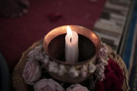 Candles burning inside the container Stock Photos