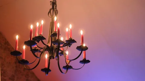 Candles burning light in Attic. Handmade docoration at home hanging on Ceiling. Stock Footage 128517795