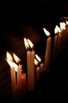 Candles burning Stock Photos