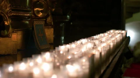 Candles Burning in a Row Stock Footage 64142236