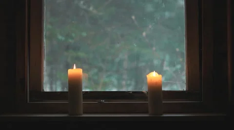 Candles Burning on Window Sill. Stock Footage 60586981