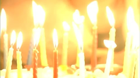Candles on cake Stock Footage 253772367